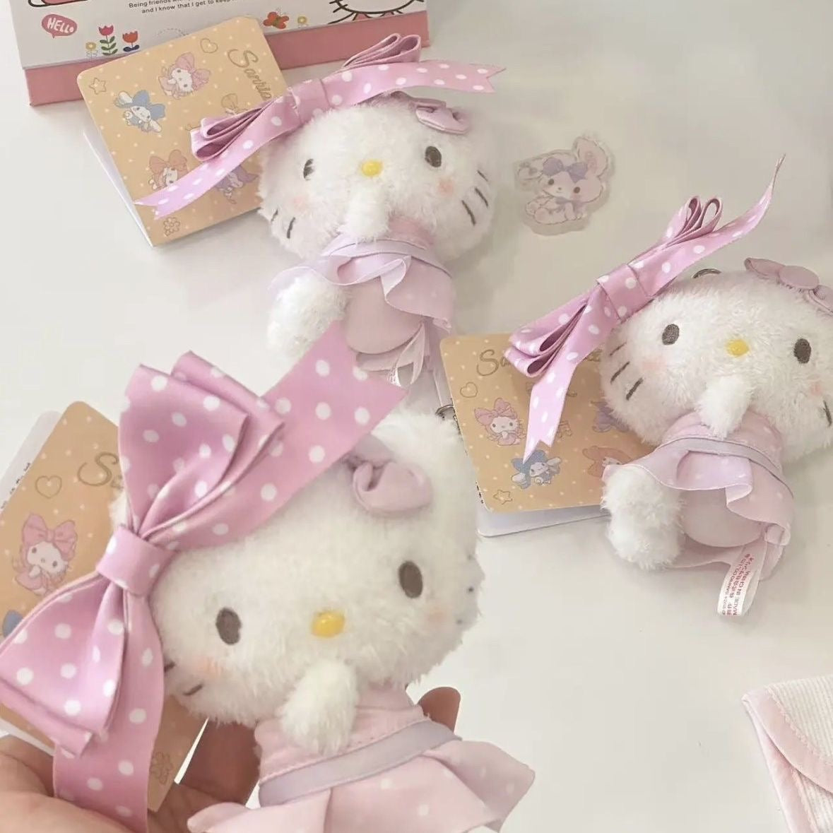 Hello Kitty Plush Bag Charm, Soft Stuffed Keychain with Pink Polka Dot Bow