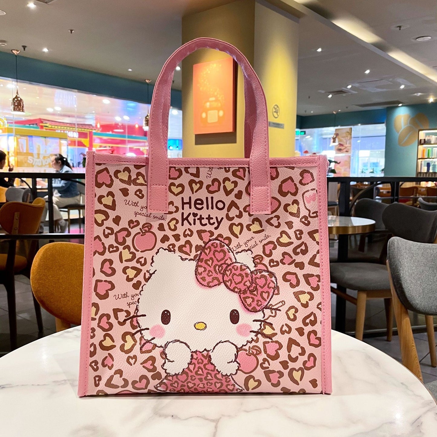 HelloKitty – Tasche mit Leopardenmuster in Rosa 
